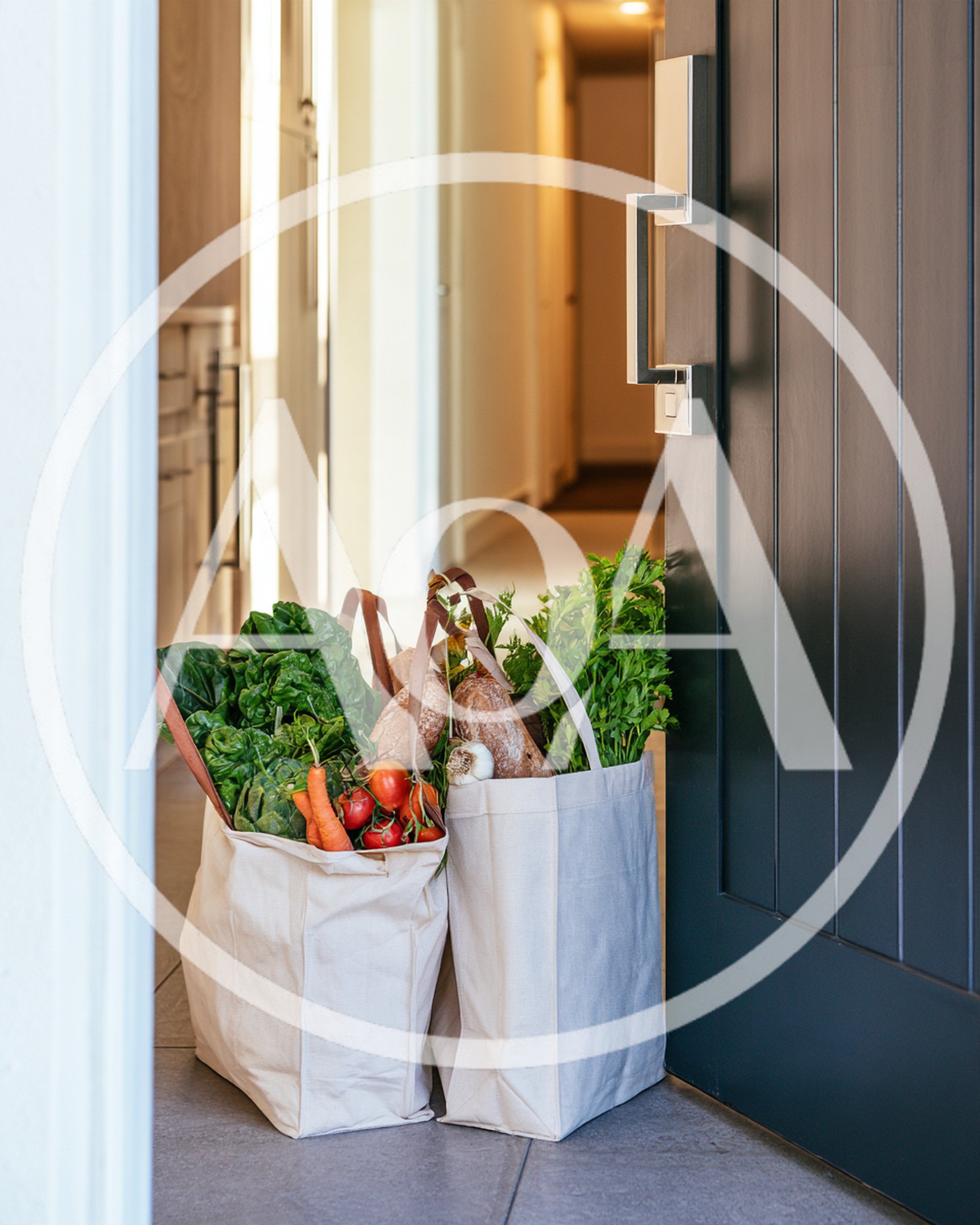Two Canvas Grocery Bags Filled With Fresh Produce