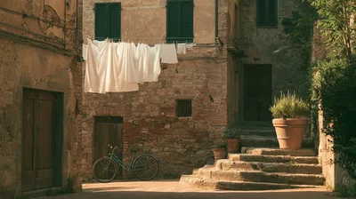 Old Italian Village Street Scene With Laundry And Bicycle