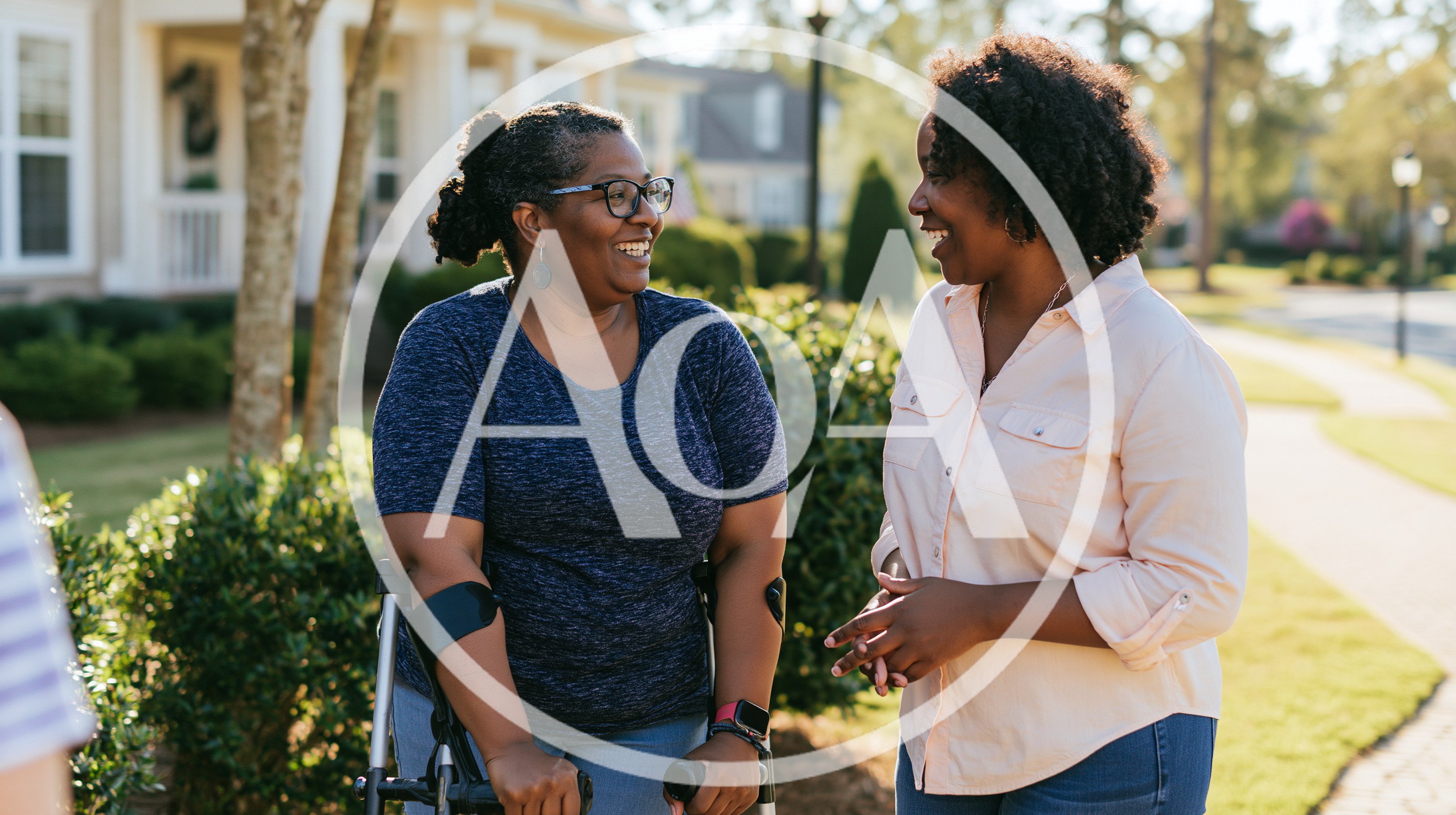 Two Women Talking Outdoors In A Residential Neighborhood