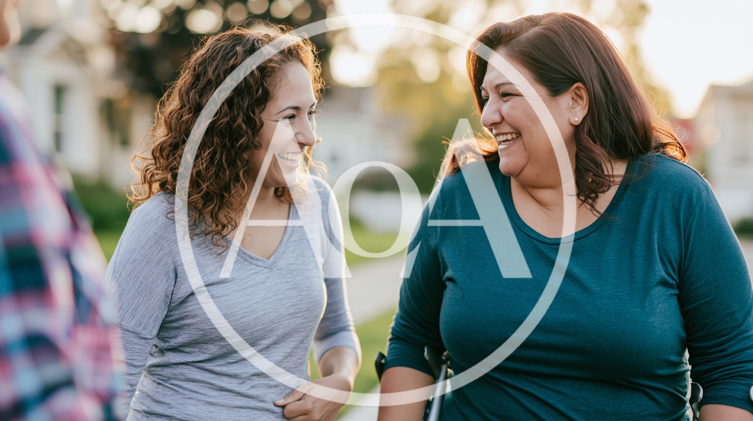 Two Women Laughing Together Outdoors