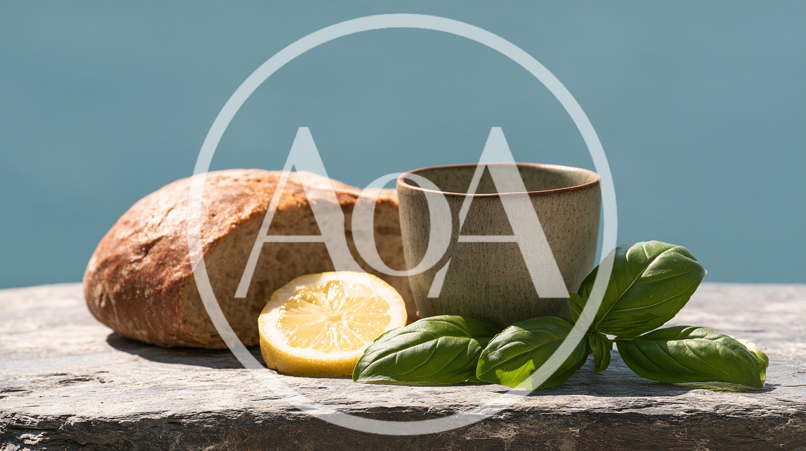 Rustic Bread Lemon and Basil on Stone Surface