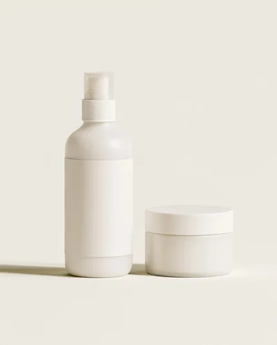 Minimalist White Cosmetic Spray Bottle and Cream Jar