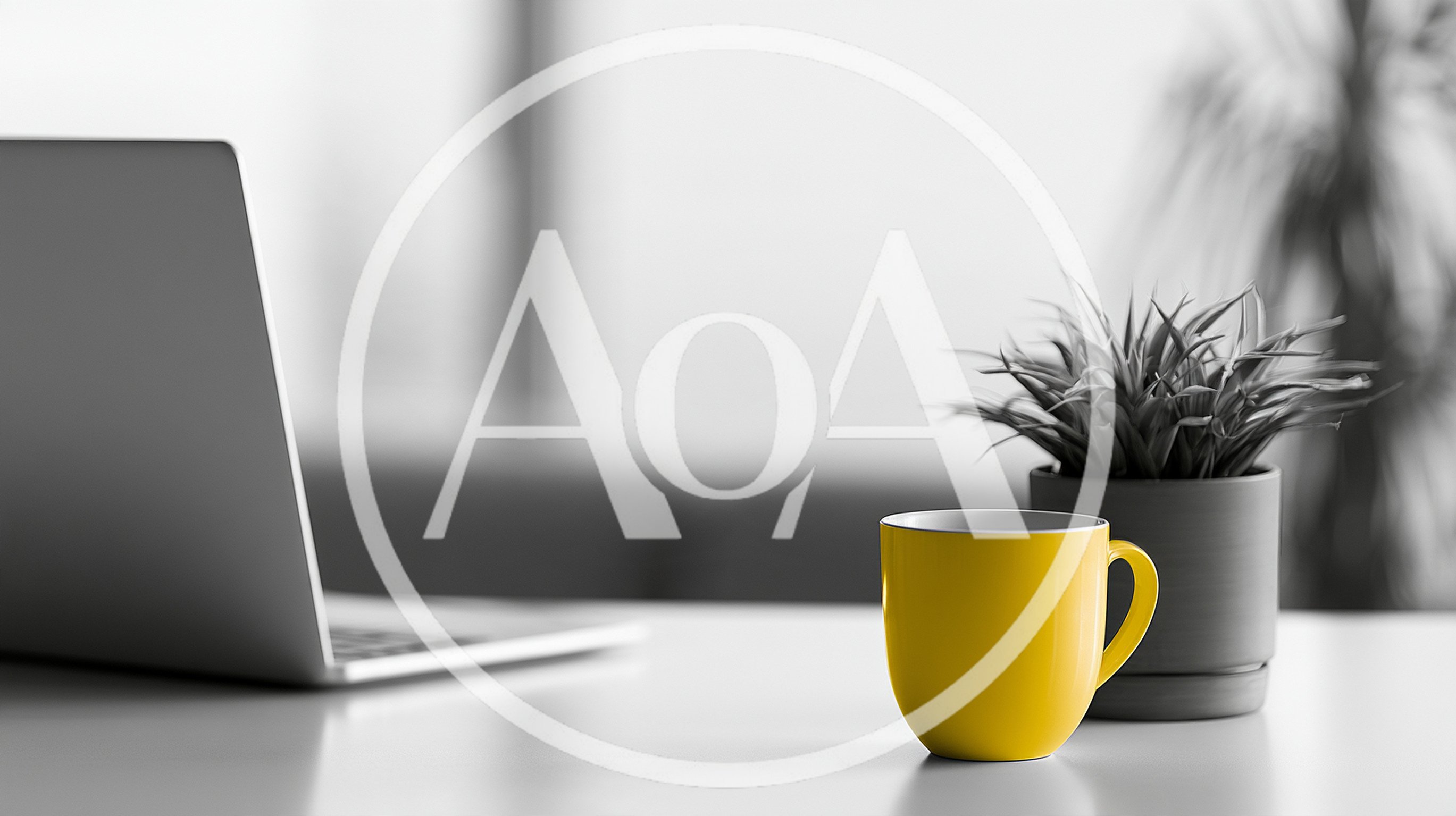 Yellow Coffee Mug And Laptop On Office Desk
