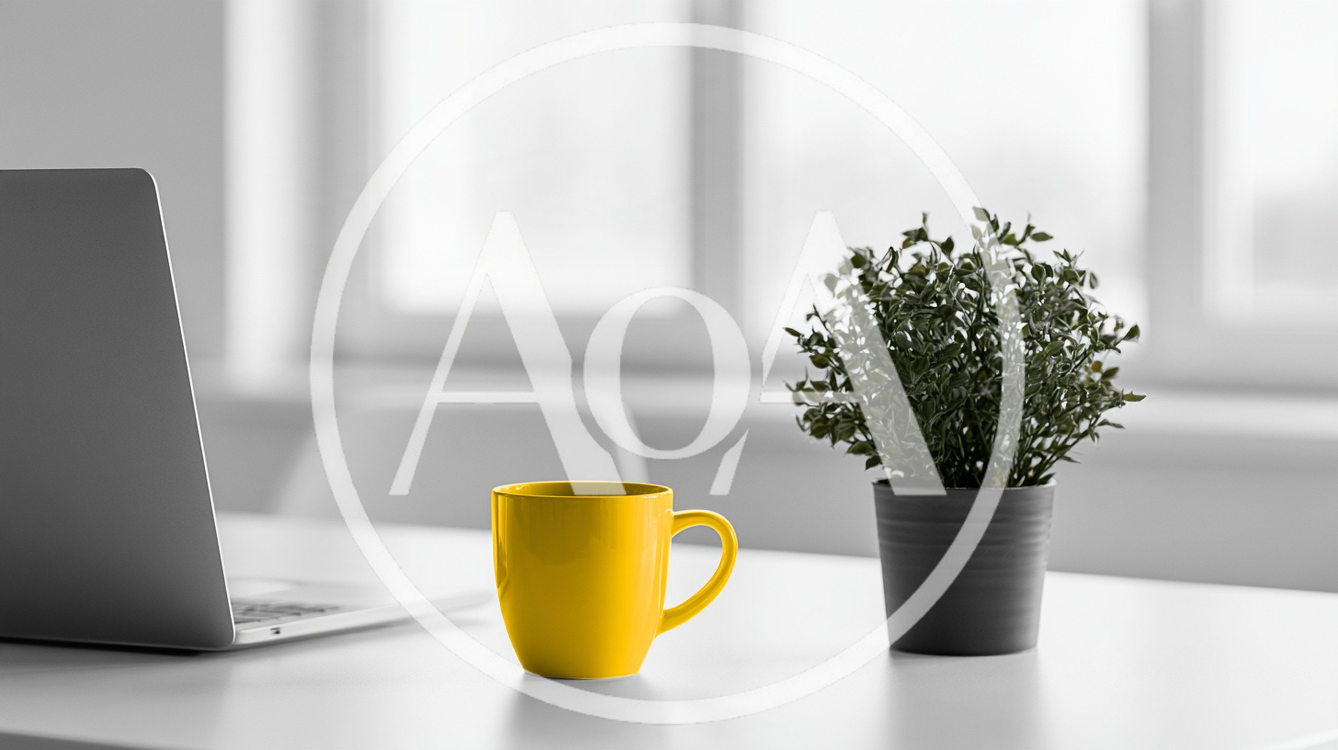 Laptop And Yellow Coffee Mug On Office Desk