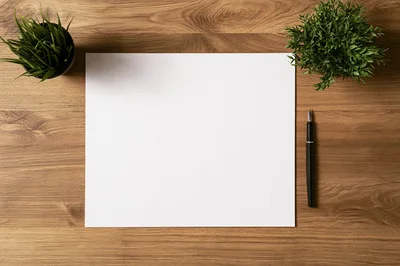 Blank Paper Sheet With Pen And Potted Plants