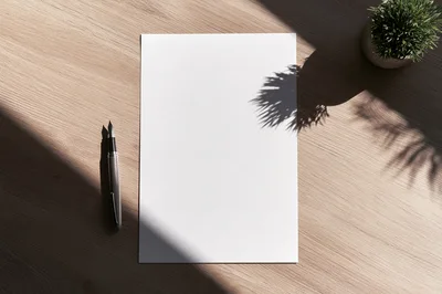 Blank Paper Sheet With Fountain Pen On Wooden Desk