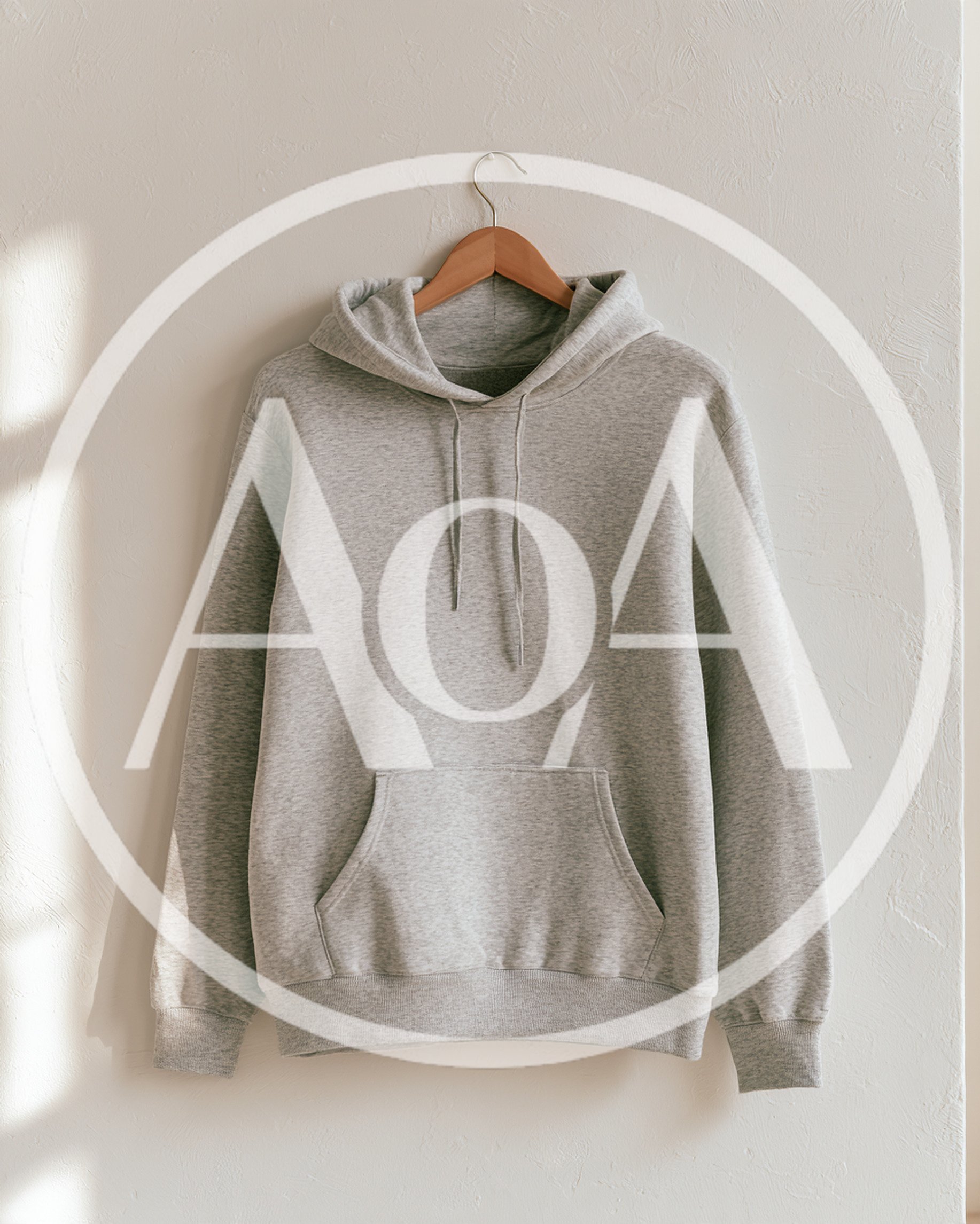 Grey Hoodie Hanging On A Wooden Hanger