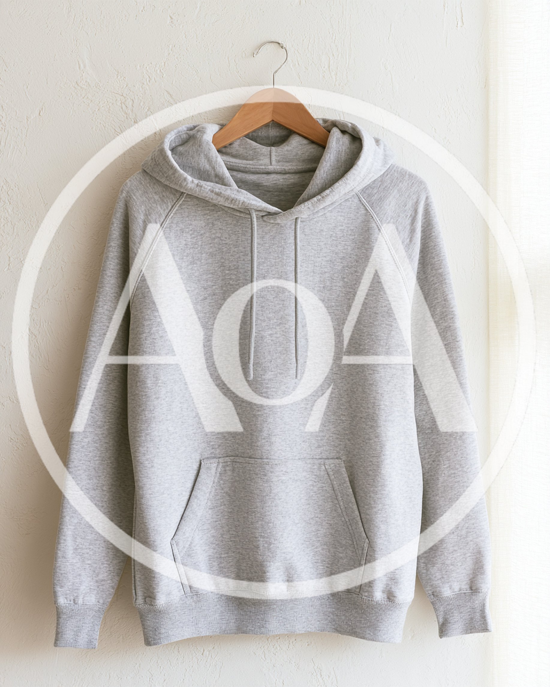 Grey Pullover Hoodie Hanging On Wooden Hanger