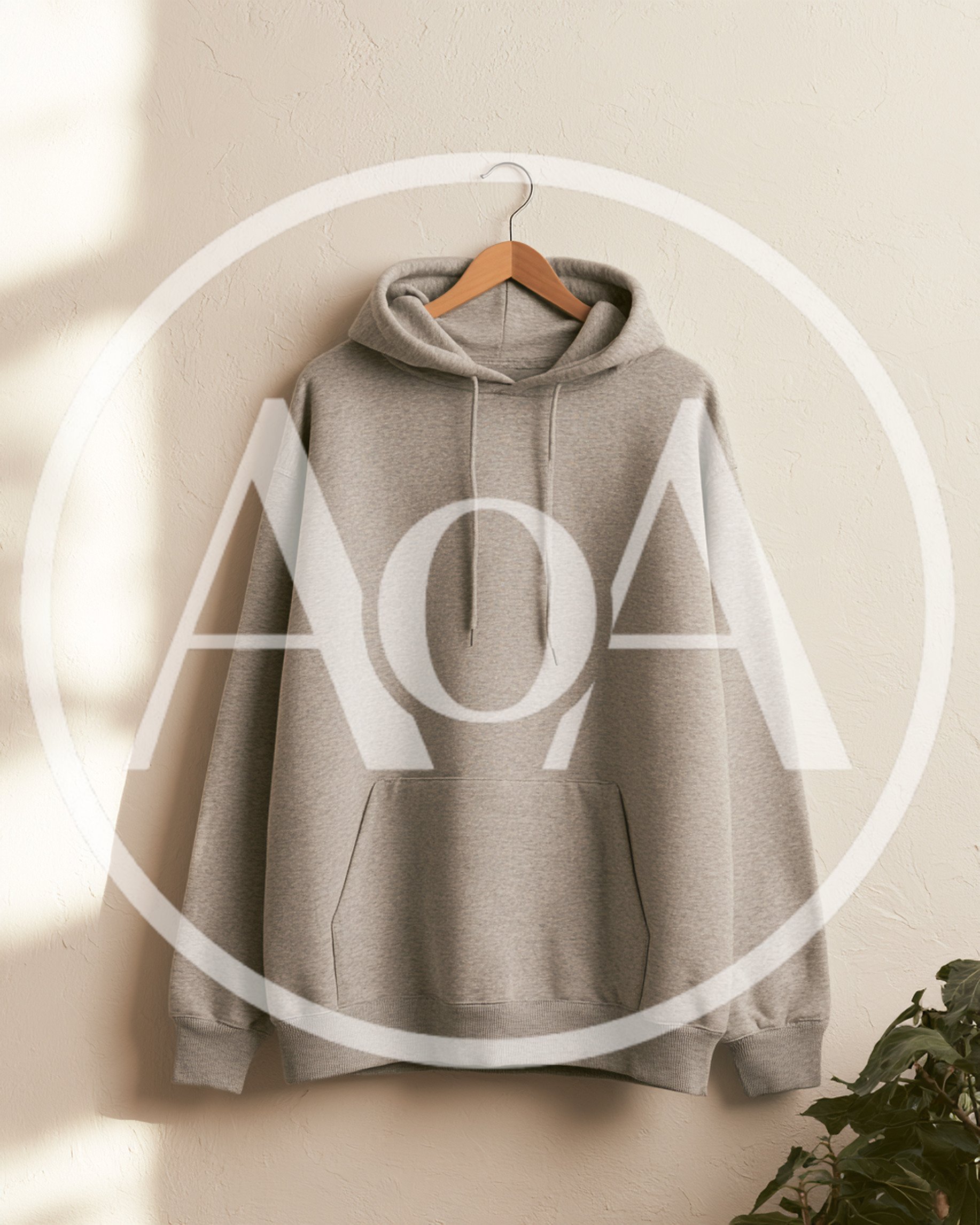 Grey Cotton Hoodie Hanging on Wooden Hanger