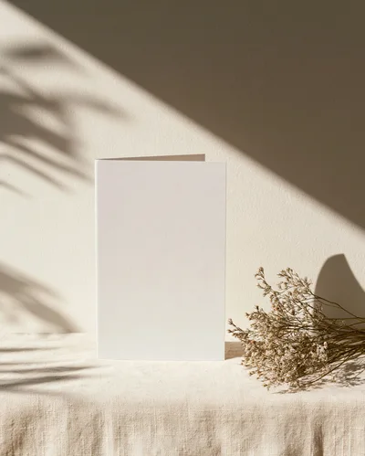Blank Folded Greeting Card Mockup With Dried Flowers