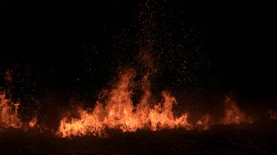 Intense Fire Burning On Dark Ground With Rising Sparks