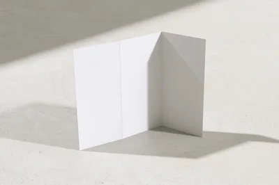 Blank White Tri-Fold Brochure Mockup On Textured Surface