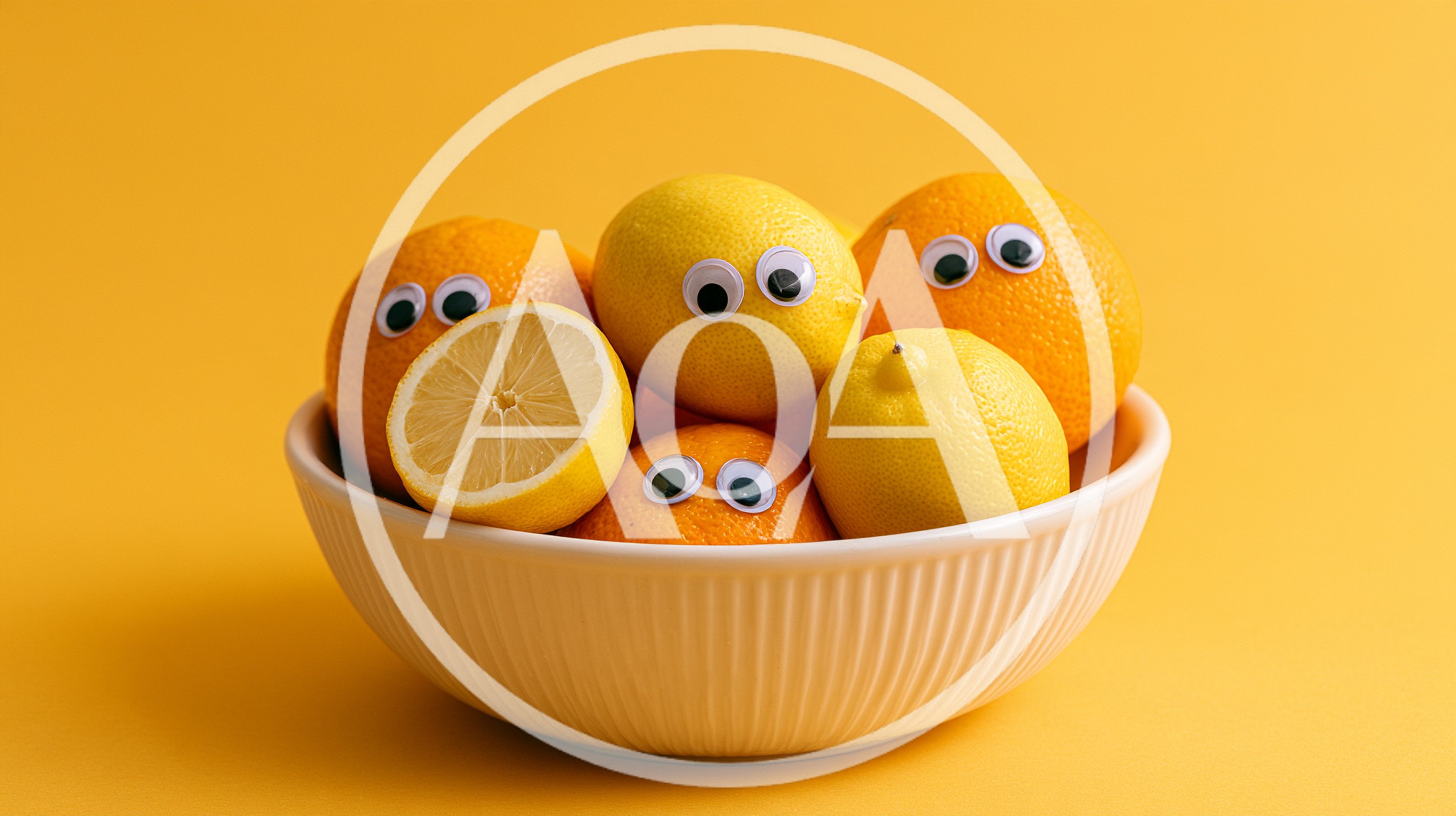Googly Eyed Citrus Fruits In A Bowl
