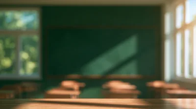 Empty Classroom With Wooden Desk In Foreground