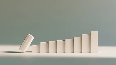 Falling Domino Block Next To Rising Bar Chart
