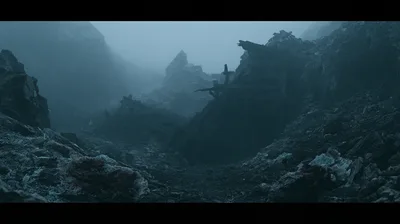 Ruined Wooden Structure In A Misty Rocky Landscape