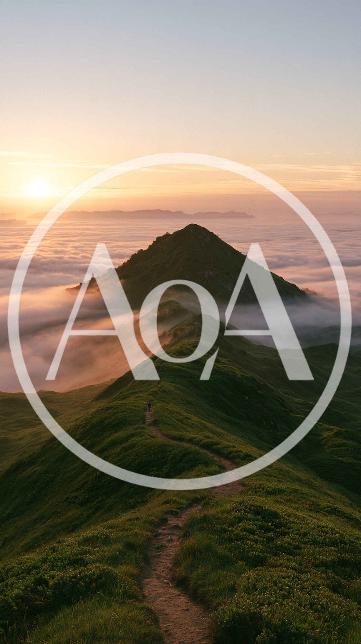 Hiker Walking Along A Mountain Ridge Above The Clouds