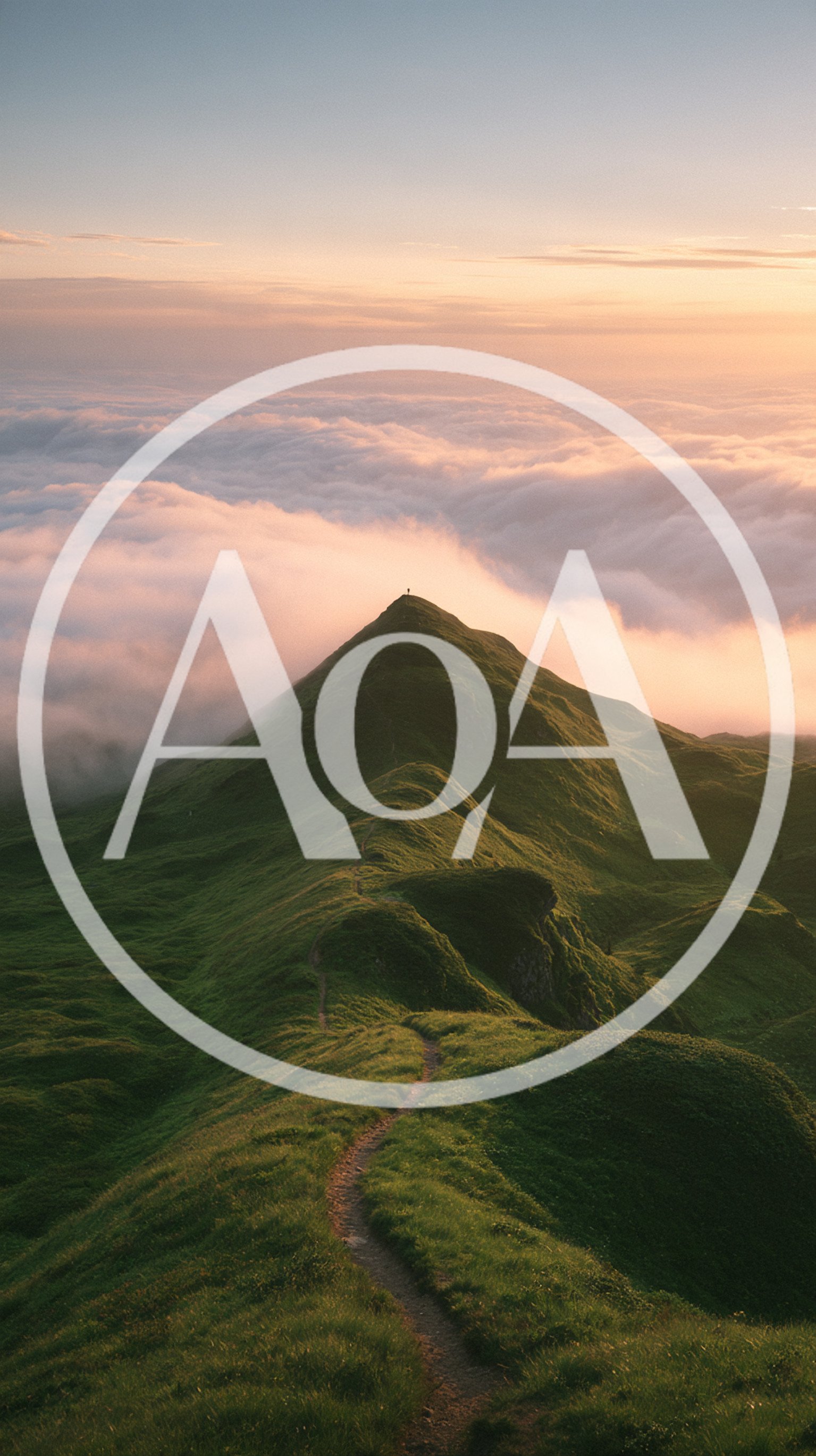 Lone Hiker Standing Atop A Green Mountain Peak