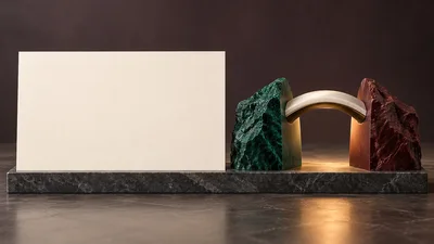Blank Business Card Display With Decorative Stone Sculptures