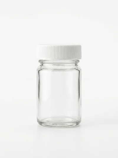Empty Clear Glass Jar With White Plastic Lid