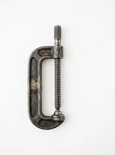 Vintage Metal C-Clamp Tool Isolated On White Background