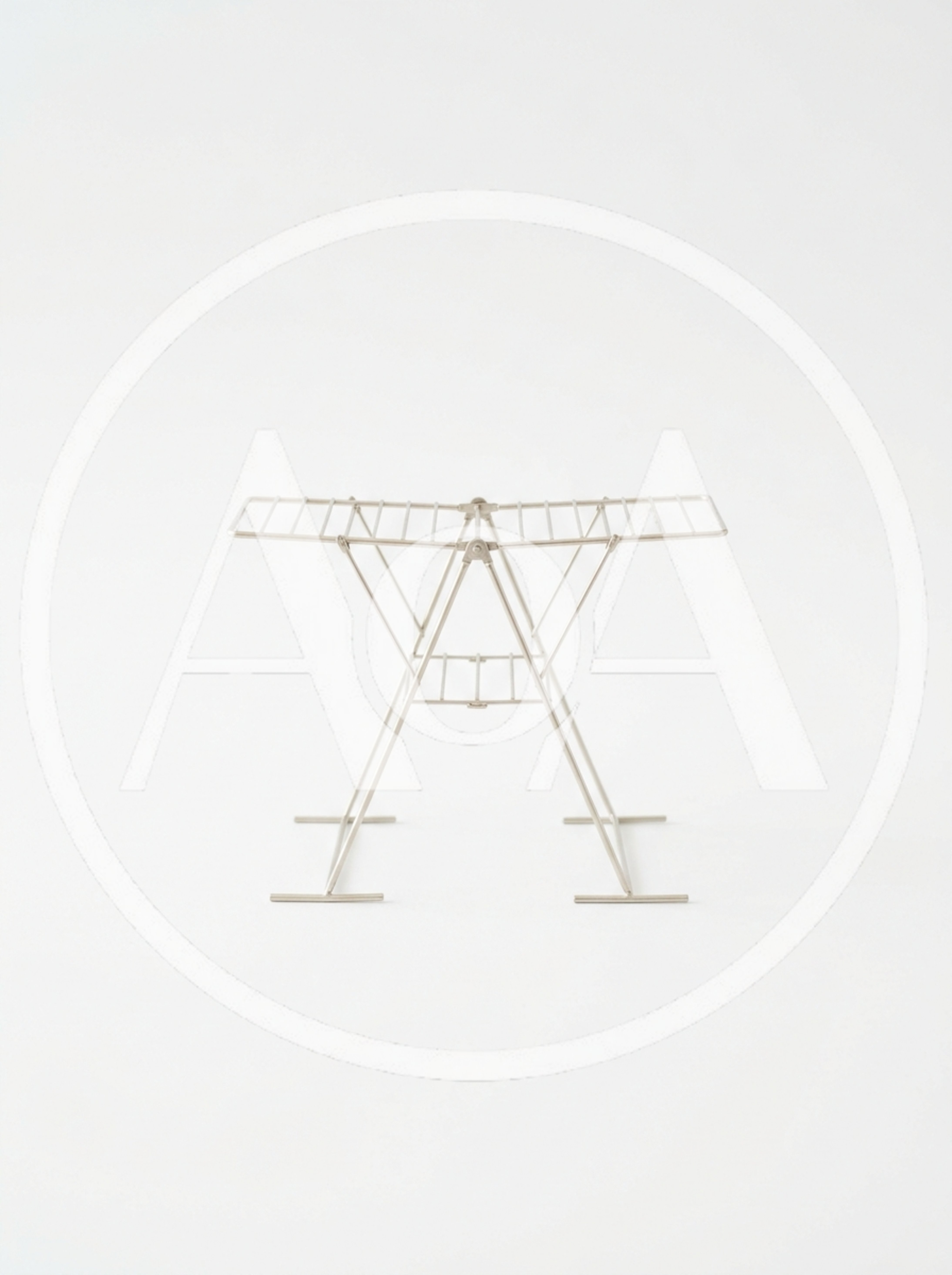 Minimalist Metal Clothes Drying Rack On White Background