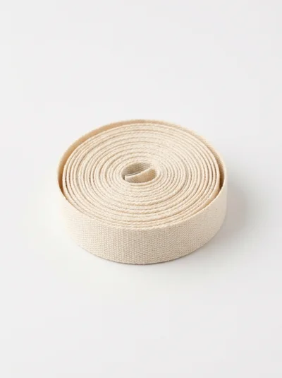 Coiled Roll Of Natural Cotton Webbing Tape