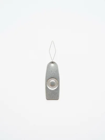 Metal Needle Threader Tool on White Background
