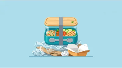 Reusable Lunch Box Surrounded By Disposable Food Waste