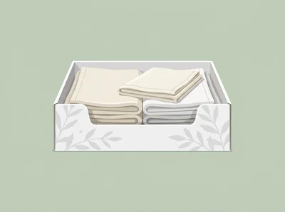 Folded Fabric Napkins In A Decorative Storage Box