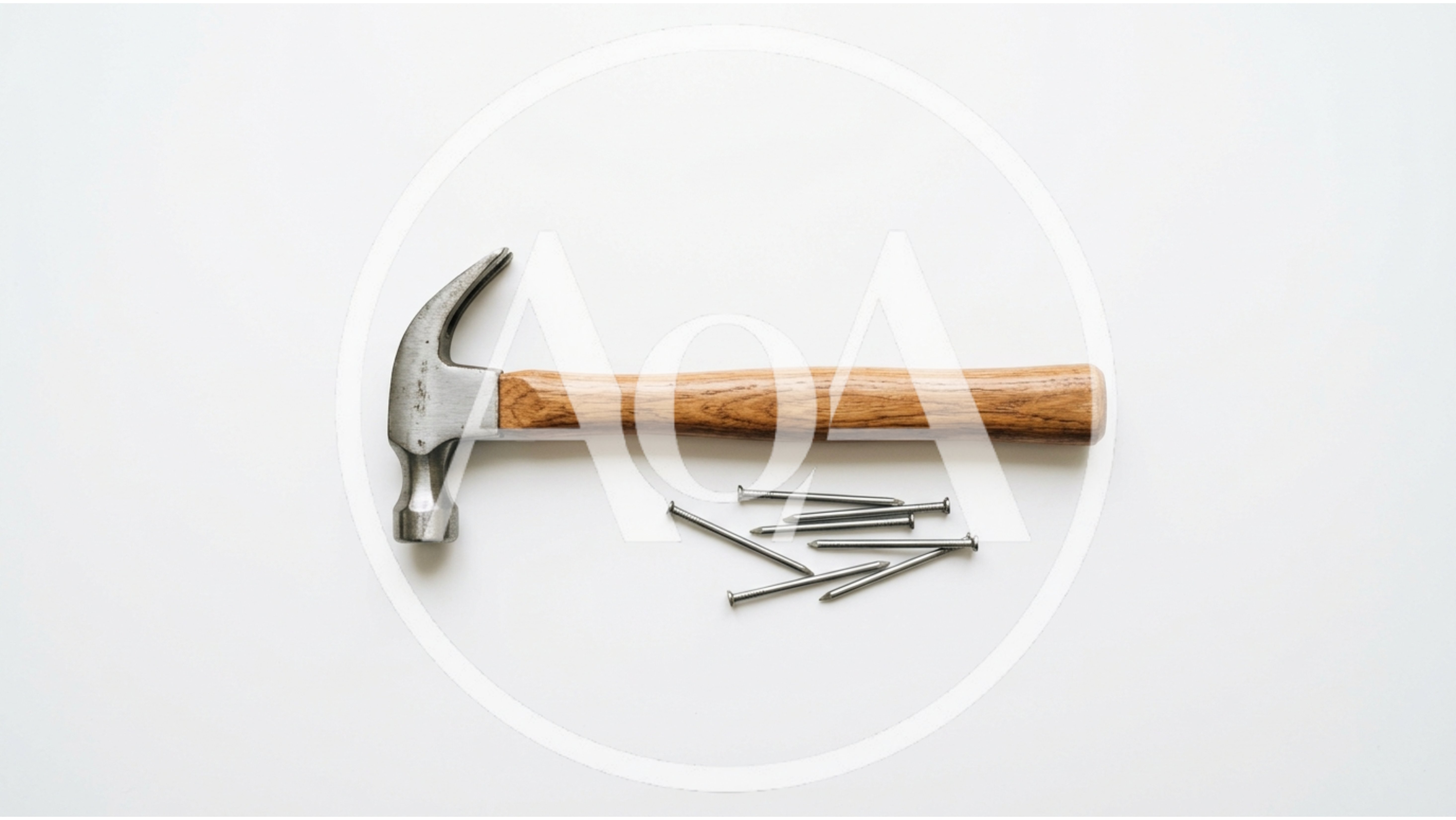 Claw Hammer And Metal Nails On White Background