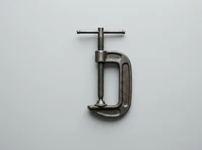 Metal C-Clamp Tool Isolated On Light Gray Background