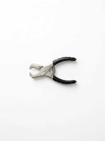 Staple Remover Tool on White Background