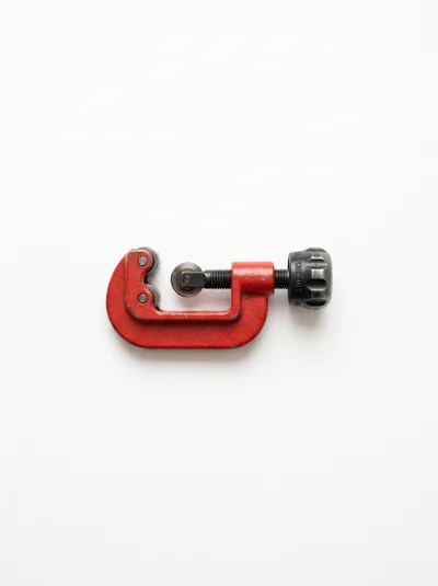 Red Metal Pipe Cutter Tool