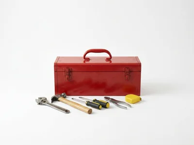 Red Metal Toolbox With Assorted Hand Tools