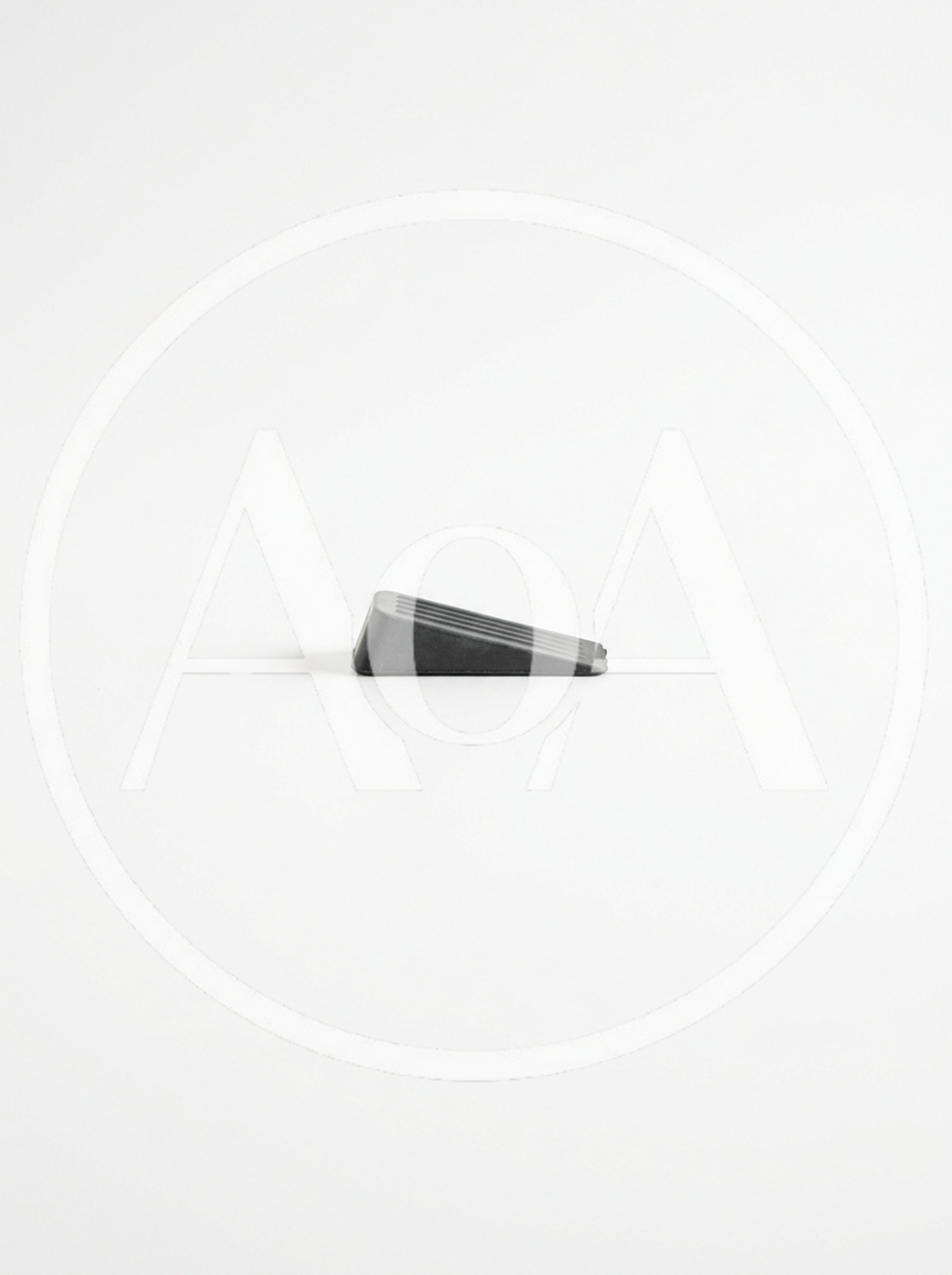 Black Rubber Door Wedge On White Background