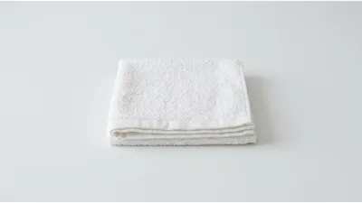 Folded White Cotton Hand Towel
