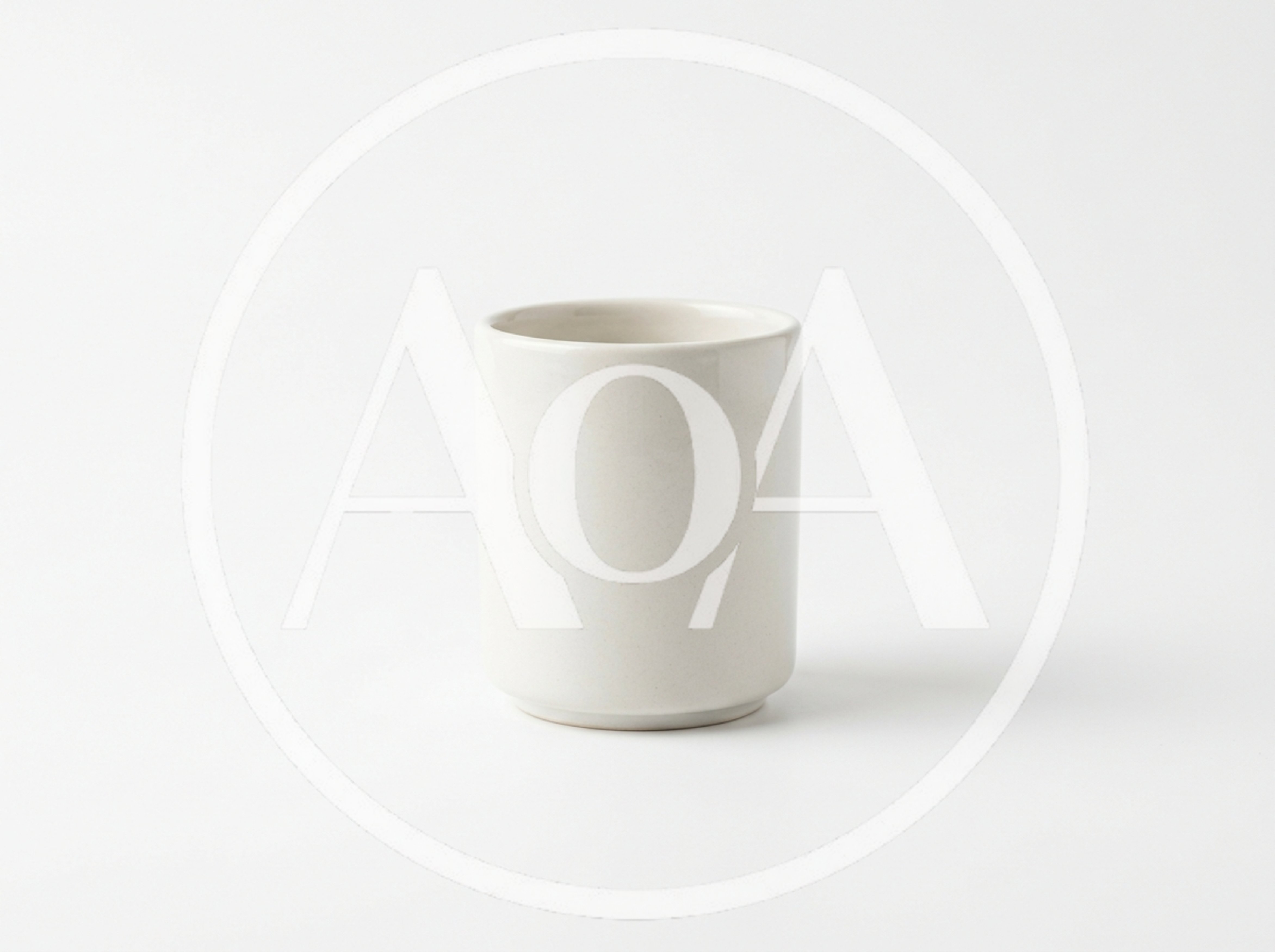 Minimalist White Ceramic Cup On White Background