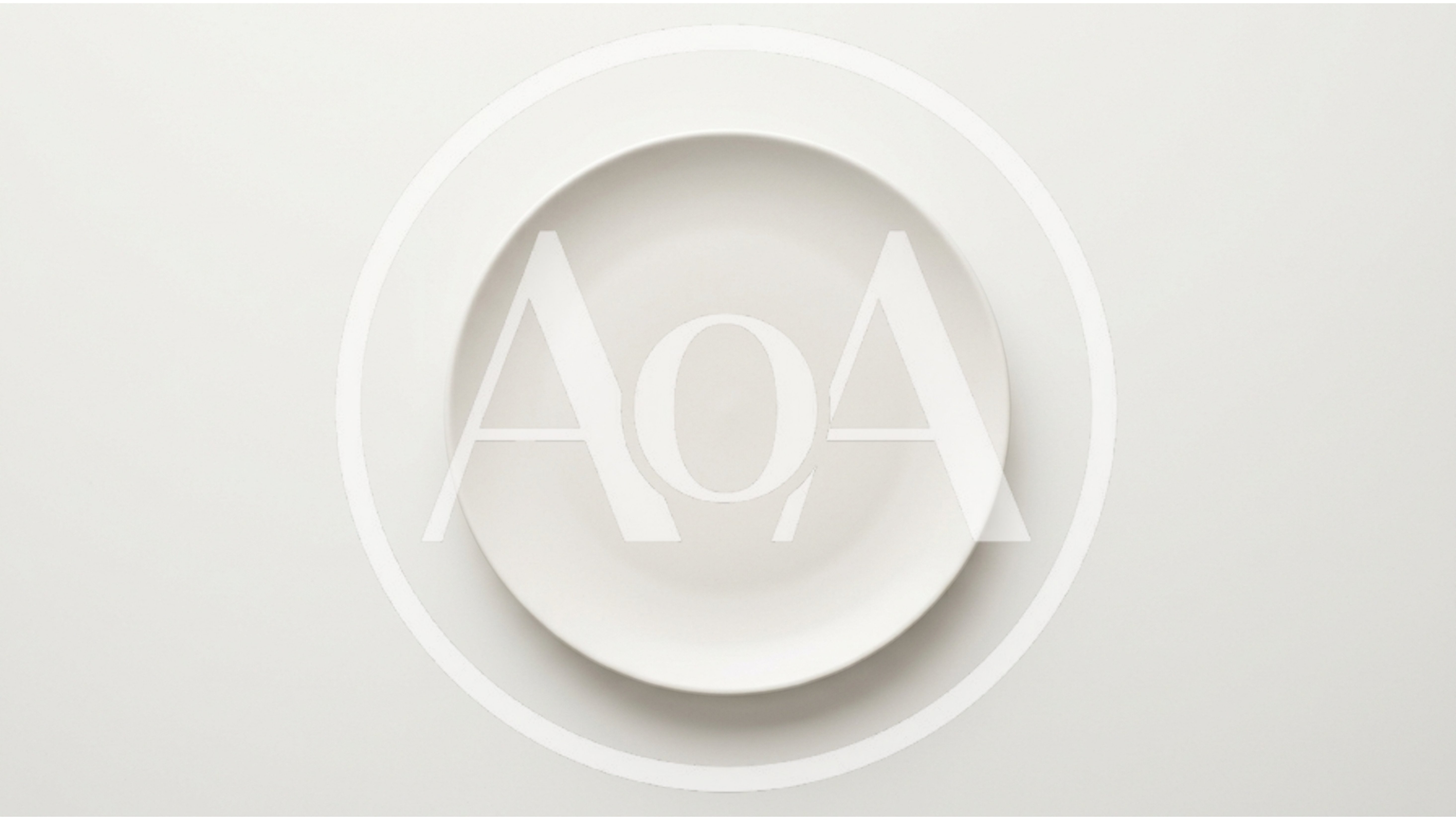 Empty White Ceramic Plate On A Plain Background