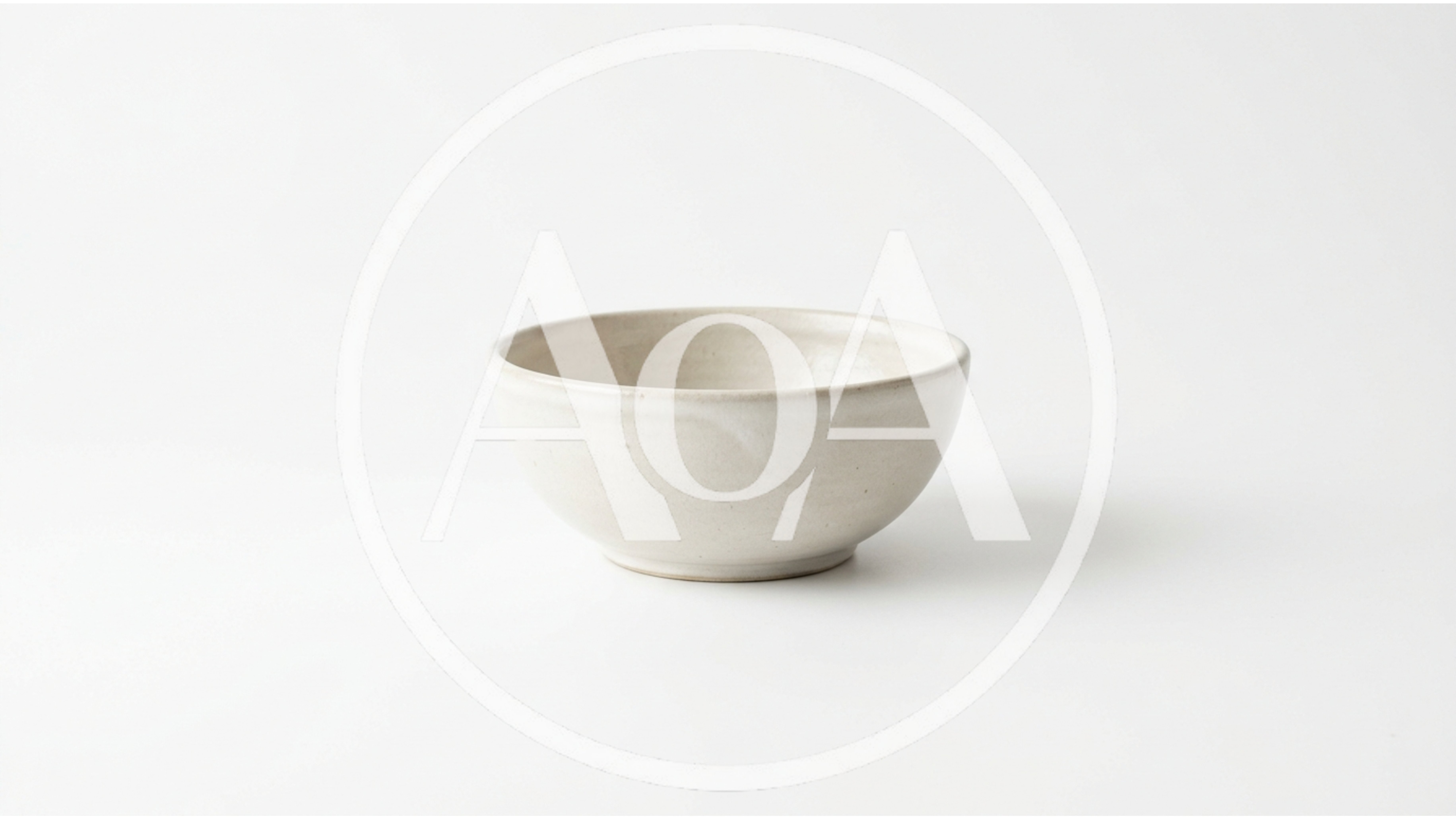 Minimalist Handmade Ceramic Bowl on White Background