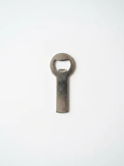 Metal Bottle Opener Isolated On White Background