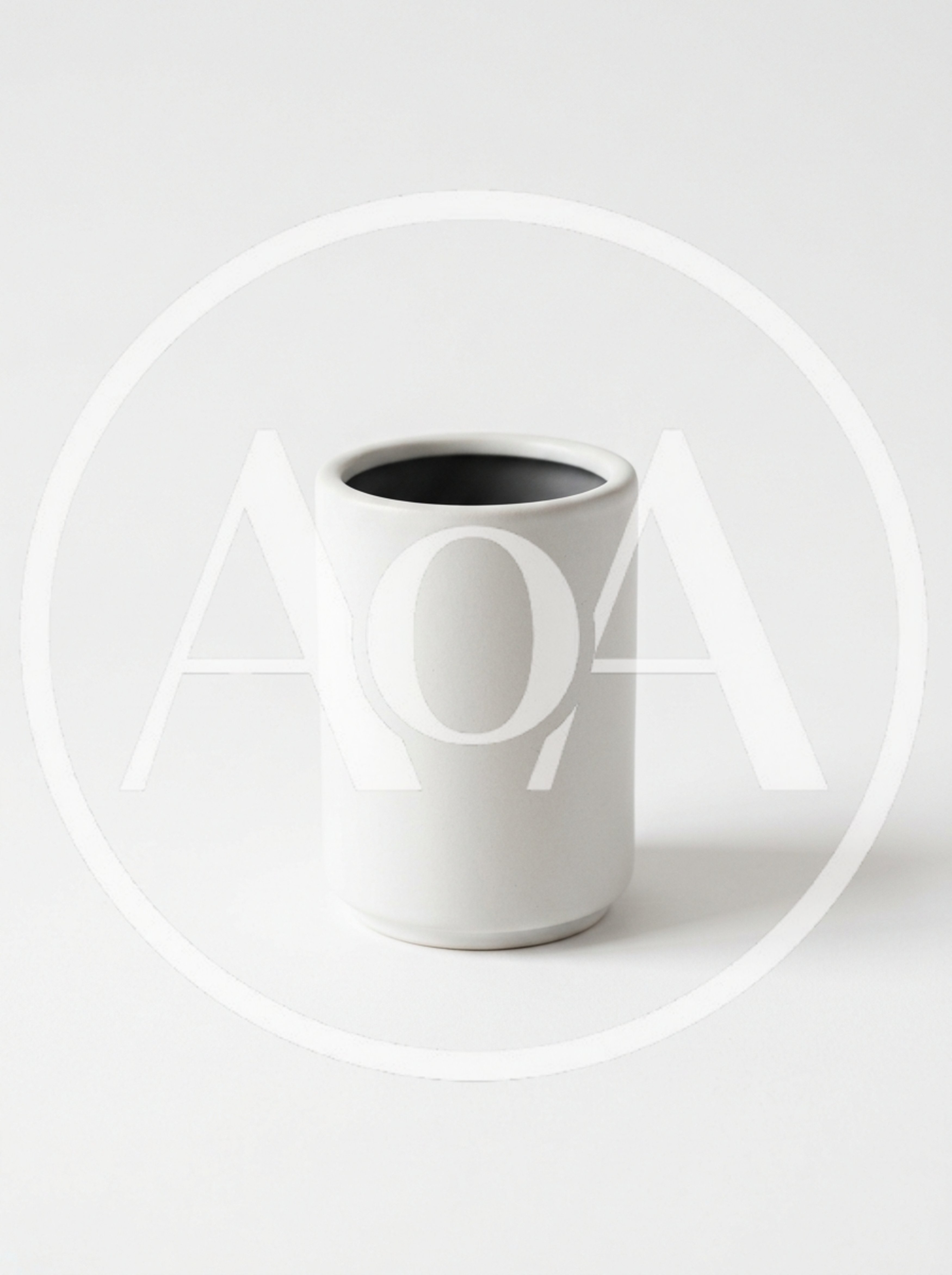 Minimalist White Ceramic Cup On White Background
