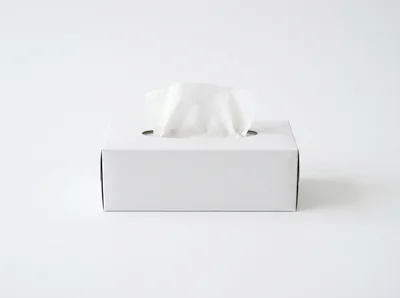 White Tissue Box With Single Tissue Pulling Out