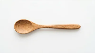 Wooden Spoon Isolated On White Background