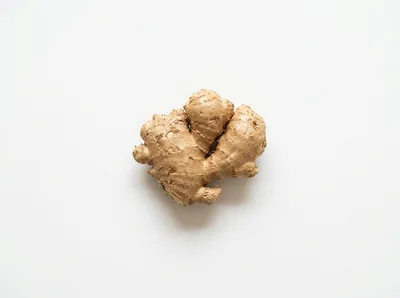 Fresh Raw Ginger Root Isolated On White Background