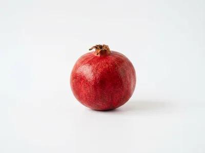 Single Fresh Red Pomegranate Fruit