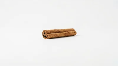 Single Cinnamon Stick Isolated On White Background