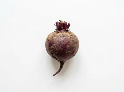 Single Fresh Raw Beetroot On White Background