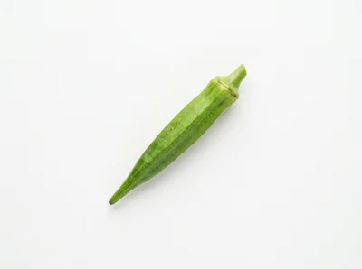 Single Fresh Green Okra Pod Isolated On White Background