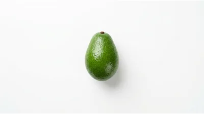 Single Fresh Green Avocado On White Background